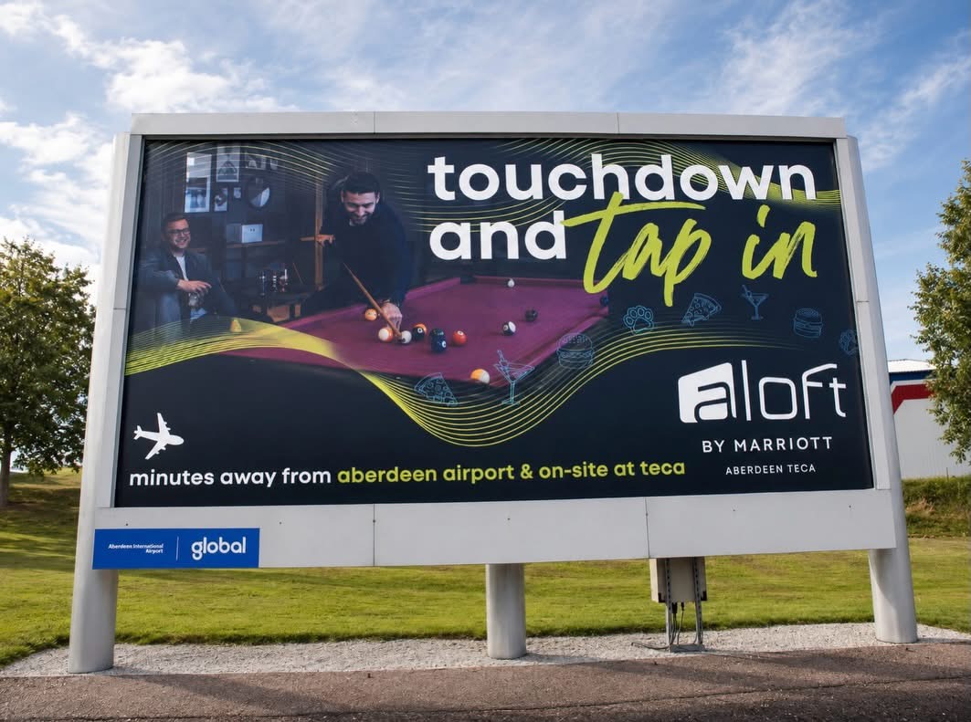 The installed Aloft airport banner seen up close